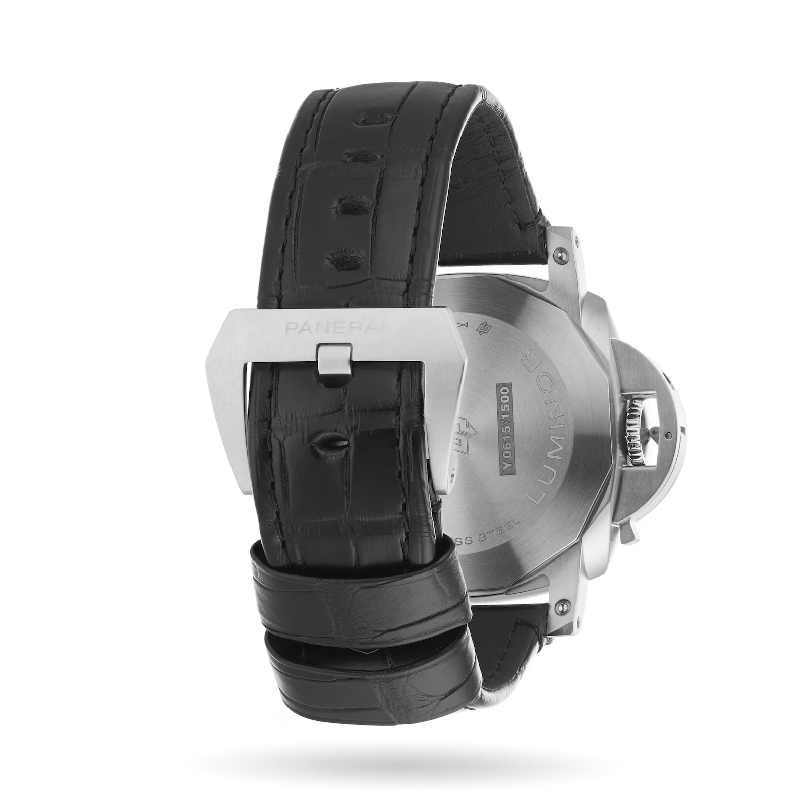 A close-up of the Panerai Luminor Chrono dive watch highlights its engraved metal case back, black leather strap with detailed stitching, and a silver buckle.