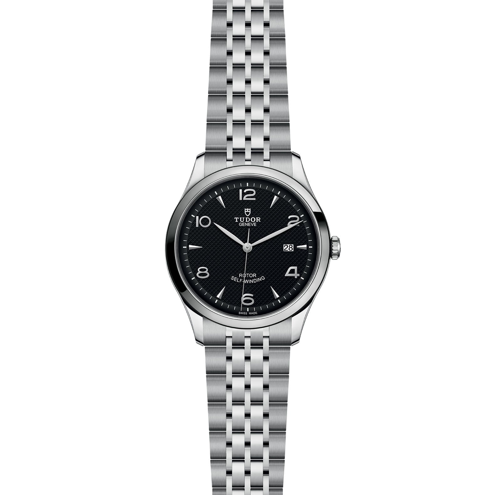 The TUDOR 1926 is a stainless steel wristwatch with a black dial, silver hour markers, a date window at 3 o’clock, a linked metal bracelet, and a durable sapphire crystal lens.