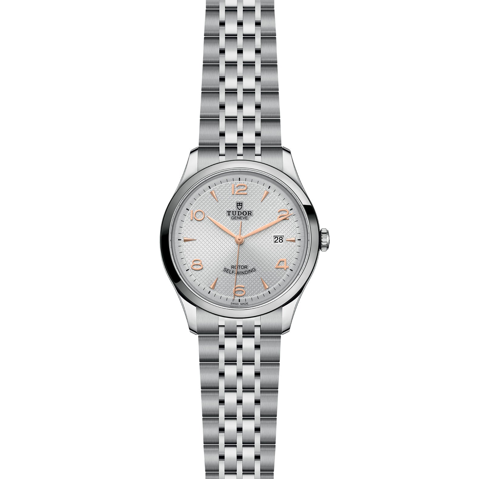 The TUDOR 1926 is a silver wristwatch featuring a metal link bracelet, white dial, gold-tone hour markers and hands, self-winding movement, and a date display at 3 o’clock.