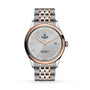 The TUDOR 1926 wristwatch features a silver textured dial, gold markers and hands, date at 3 oclock, and a two-tone bracelet—a classic mechanical choice for watch enthusiasts.