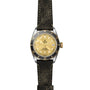 The TUDOR Black Bay S&G features a gold dial, black bezel, and a distressed black leather strap.
