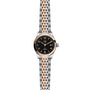 The TUDOR 1926 is a classic, elegant two-tone wristwatch with a black dial, gold hour markers, date display, and a silver and rose gold link bracelet—ideal for fine mechanical watch enthusiasts.