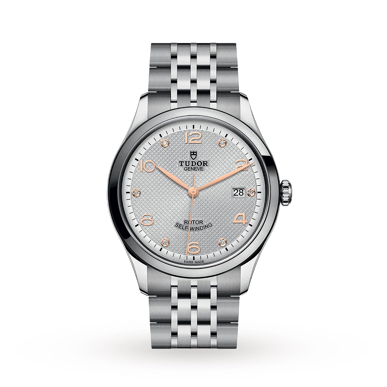 The TUDOR 1926 is a silver wristwatch with a textured light gray dial, rose gold markers and hands, a date display at 3 o’clock, and a metal bracelet—a refined mechanical timepiece from the TUDOR collection.