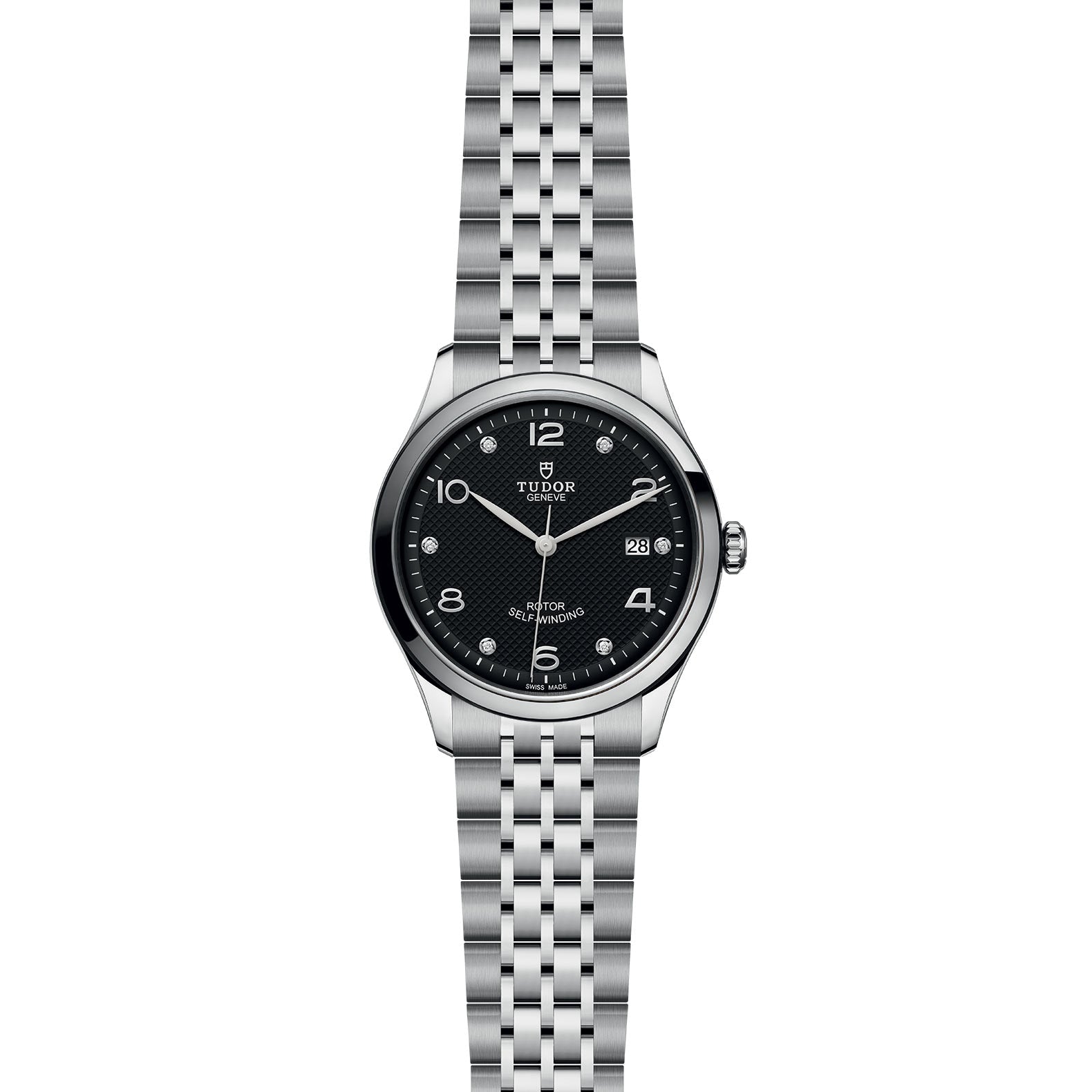 The TUDOR 1926 men’s watch features a silver case, black dial, silver numerals, date at 3 o’clock, and metal link bracelet—reflecting Hans Wilsdorf’s tradition of mechanical timepieces against a white background.