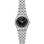 The TUDOR Royal is a stainless steel wristwatch with a black dial, Roman numerals, date at 3 o’clock, and a five-link bracelet—an ideal sport-chic timepiece for your collection.
