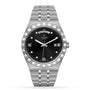 The TUDOR Royal wristwatch features a stainless steel case, black dial, day-date display, Roman numerals, diamond hour markers, and a link bracelet—a sport-chic choice from TUDOR.