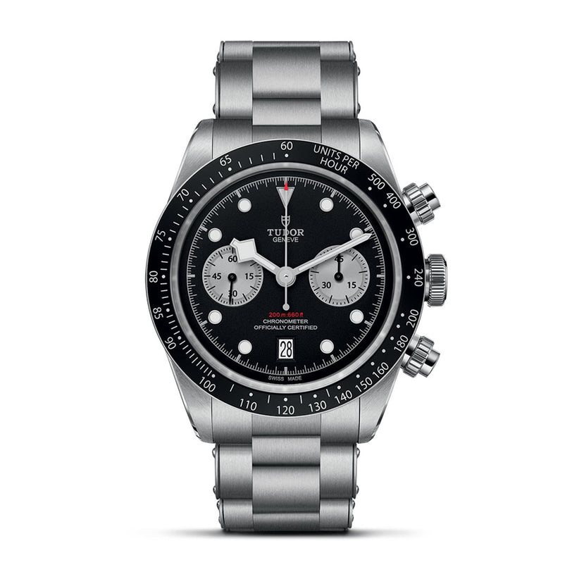 A TUDOR Black Bay Chrono stainless steel wristwatch with a black dial, three sub-dials, tachymetric bezel, and metal bracelet is photographed against a white background.
