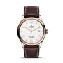 The TUDOR 1926 is a classic, elegant wristwatch featuring a white dial, gold-tone bezel, brown leather strap, date at 3 o’clock, and Rotor Self-Winding text above 6—ideal for mechanical watch enthusiasts.