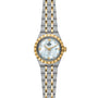 The TUDOR Royal features a two-tone integrated bracelet, fluted bezel, mother-of-pearl dial with diamond hour markers, date window, and gold accents on the hands and indices for a refined sport-chic style.