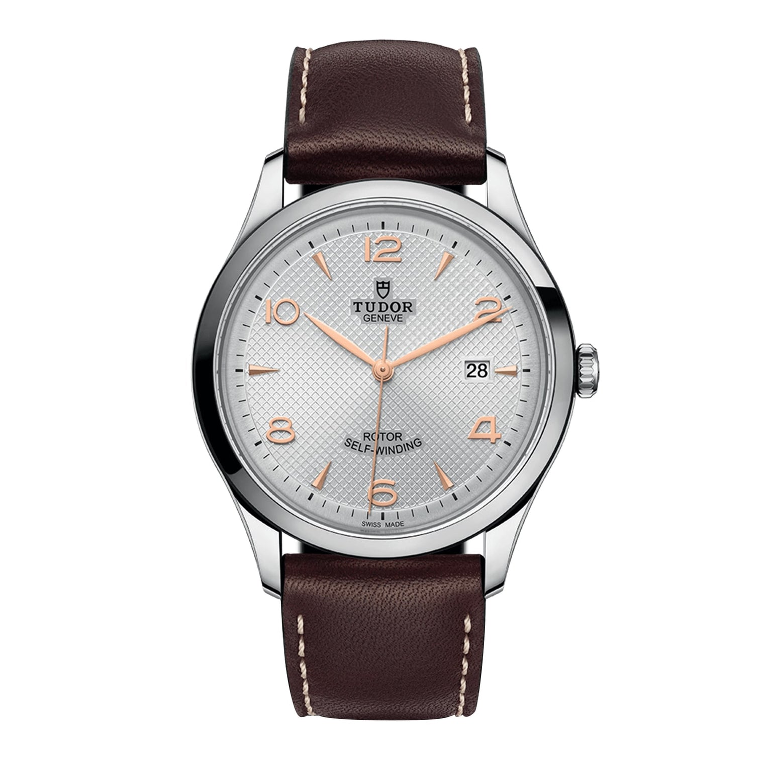 A TUDOR 1926 wristwatch featuring a brown leather strap, silver case, white textured dial, rose gold indices and hands, and a 3 o’clock date window—crafted by the brand founded by Rolex’s creator.
