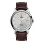 The TUDOR 1926 is a classic wristwatch featuring a silver dial, gold hour markers, mechanical movement, date at 3 o’clock, brown leather strap, and stainless steel case.