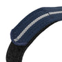 Close-up of the TUDOR Pelagos FXD’s blue fabric strap featuring a white stitched line and a black textured underside.