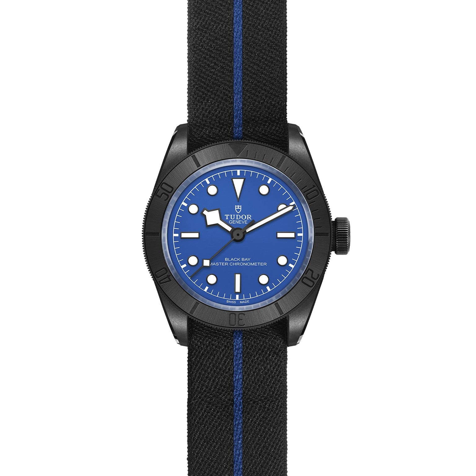 The TUDOR Black Bay Ceramic Blue wristwatch features a blue dial, black bezel, Snowflake hands, and a black fabric strap with a blue center stripe, honoring TUDOR divers’ watch heritage.