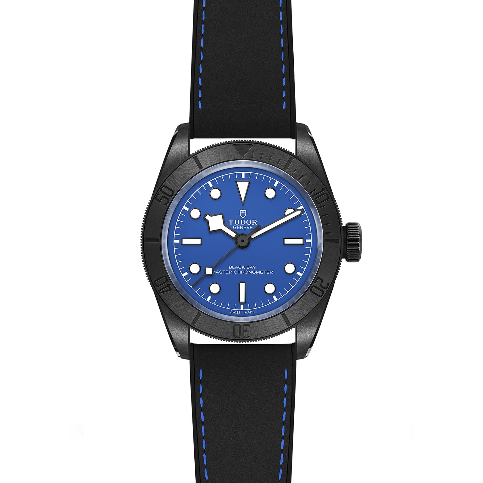 The TUDOR Black Bay Ceramic Blue showcases a blue dial, black bezel, and a black rubber strap with blue stitching, accented by signature Snowflake hands—all presented on a white background.