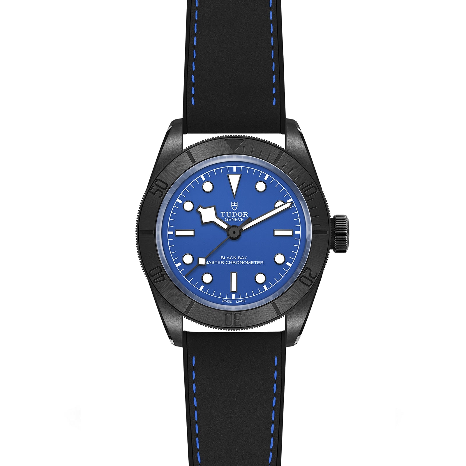 The TUDOR Black Bay Ceramic Blue showcases a blue dial, black bezel, and a black rubber strap with blue stitching, accented by signature Snowflake hands—all presented on a white background.