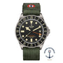 TUDOR Pelagos FXD GMT watch with green fabric strap, featuring the Marine Nationale logo at the bottom right.