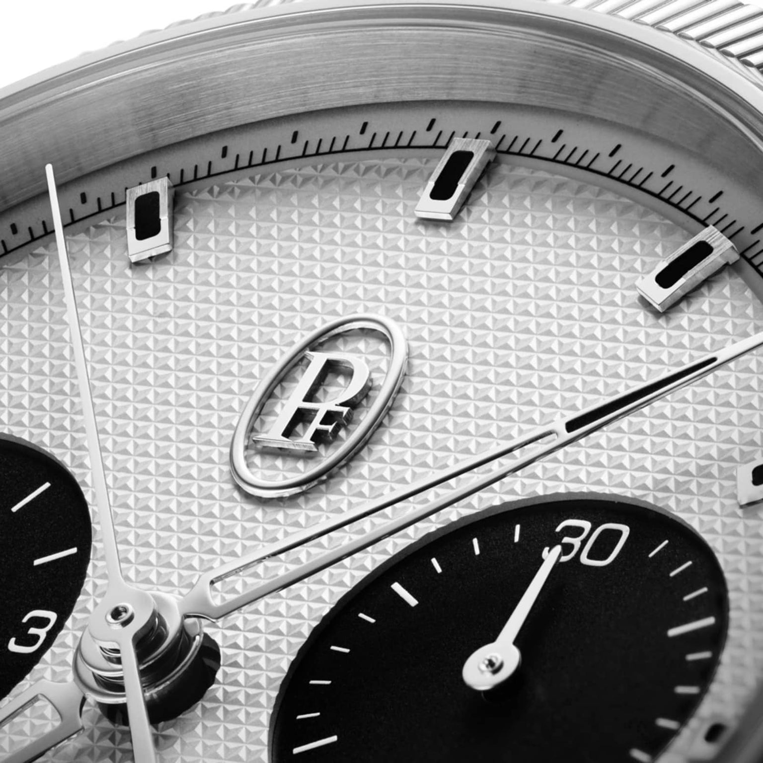Close-up of the Parmigiani Fleurier TONDA PF Sport Chronograph, highlighting its textured dial and two black subdials.