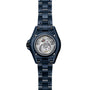 The Chanel J12 Bleu Watch Caliber 12.2, 33 mm features a blue design, visible mechanical movement, and limited edition engraving on the back.