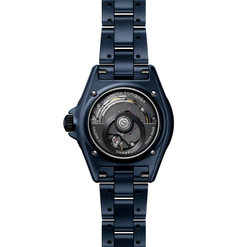 Back view of the Chanel J12 Bleu Watch Caliber 12.1, 38 mm, displaying its mechanical movement and Limited Edition engraving.