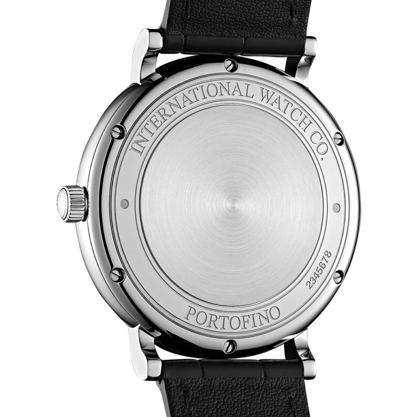Close-up of the back of the IWC Schaffhausen Portofino Automatic, showing engraved numbers on the stainless steel case and a visible black leather strap.