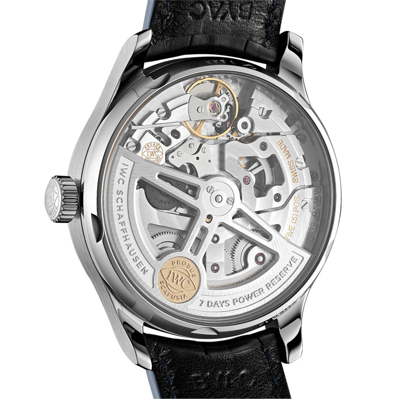 Close-up of the IWC Schaffhausen Portugieser Automatic’s back, displaying its self-winding movement, engraved detailing, and black leather strap—a true showcase of luxury watchmaking.