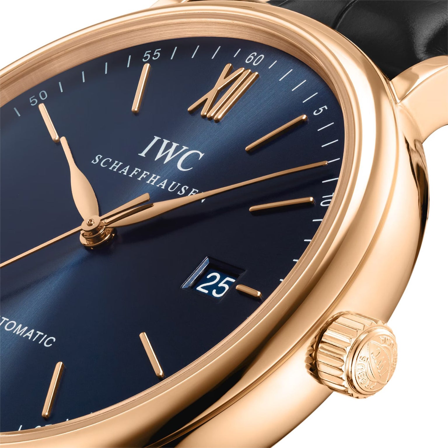 Close-up of a gold IWC Schaffhausen Portofino Automatic wristwatch featuring a blue dial, Roman numeral XII, date display set to 25, and Swiss precision automatic self-winding movement indicated on the face.
