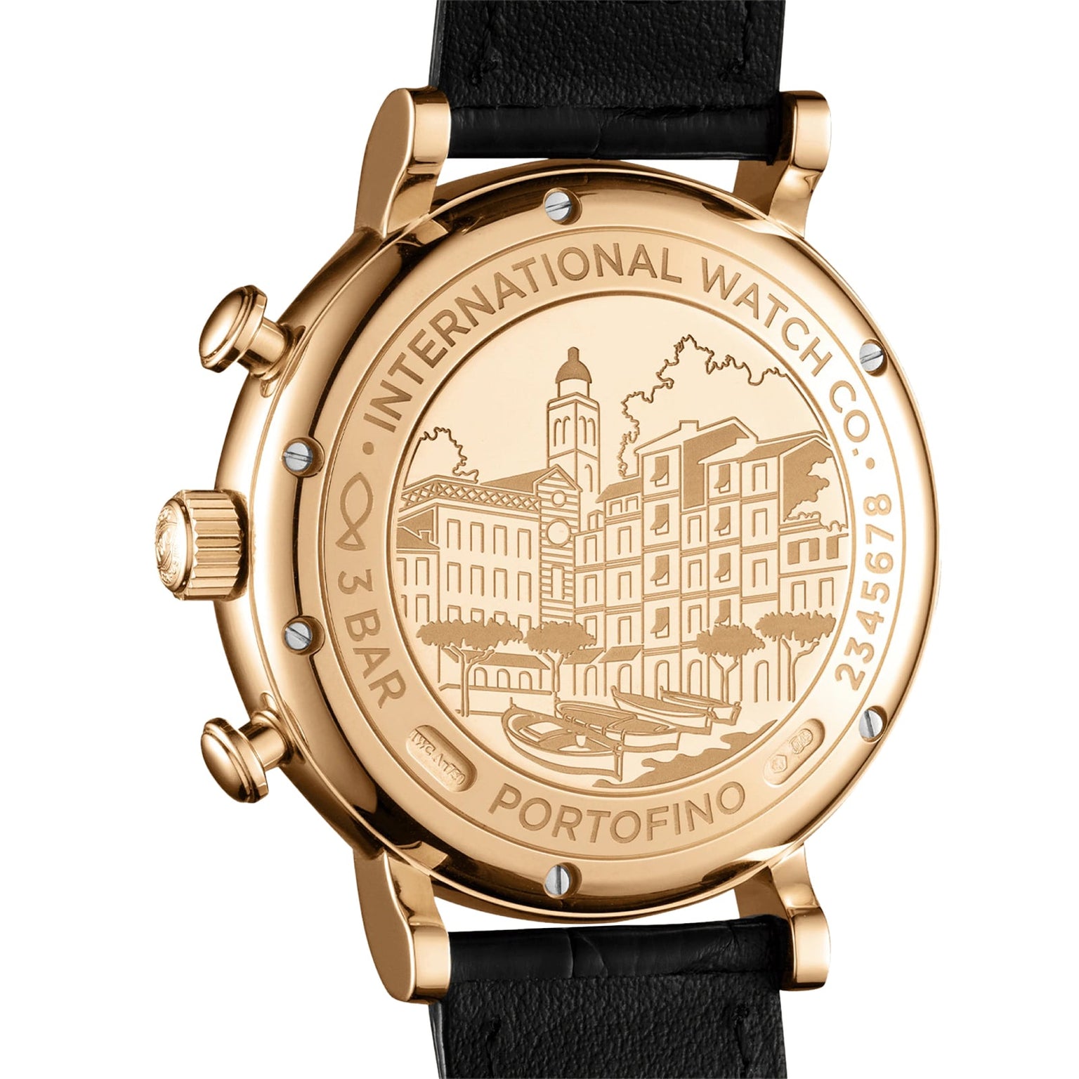Close-up of the IWC Schaffhausen Portofino Chronographs 18ct 5N gold case back, engraved with a building scene and labeled INTERNATIONAL WATCH CO. PORTOFINO 3 BAR, on a black leather strap with automatic self-winding movement.