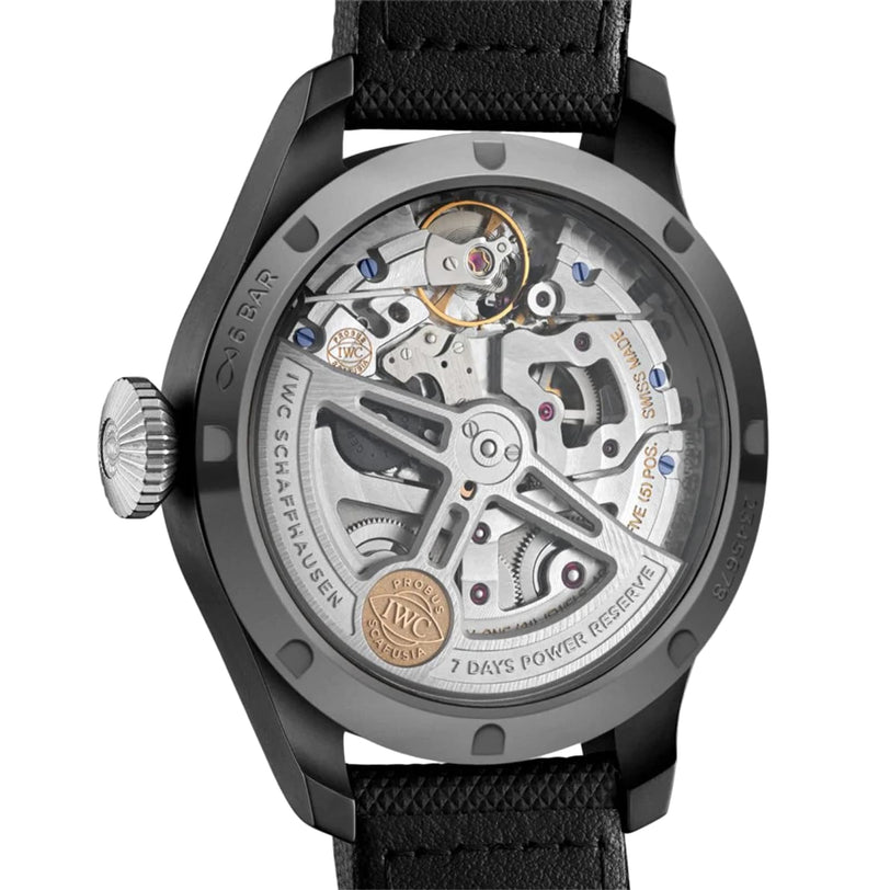 Close-up of the IWC Schaffhausen Big Pilots Watch Perpetual Calendar Edition Rodeo Drive back, showcasing its intricate mechanical movement and gears through a transparent case back set in a ceramic and titanium case.