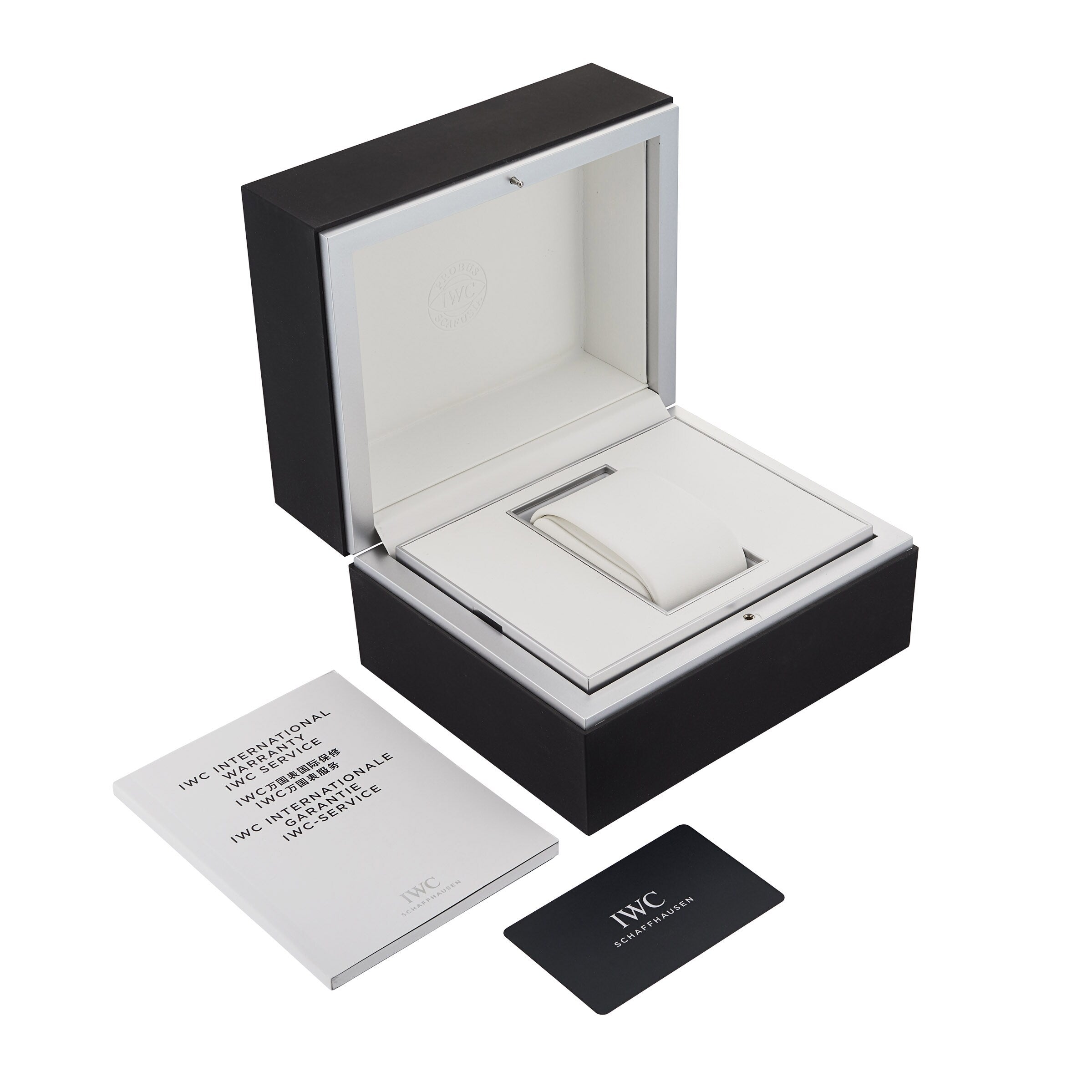Open black and white IWC Schaffhausen watch box with cushion, white booklet, and black warranty card—perfect for your Portugieser Chronograph or any IWC automatic watch, all displayed on a clean white background.