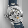 Close-up of the IWC Schaffhausen Big Pilots Watch 43, showcasing its exposed mechanical movement through a transparent caseback and paired with a blue leather strap—a hallmark of IWC Pilot’s Watches.