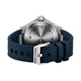 A close-up of the IWC Schaffhausen Aquatimer Automatic shows its stainless steel case, detailed engraved caseback, and dark blue textured strap with a stainless steel buckle.