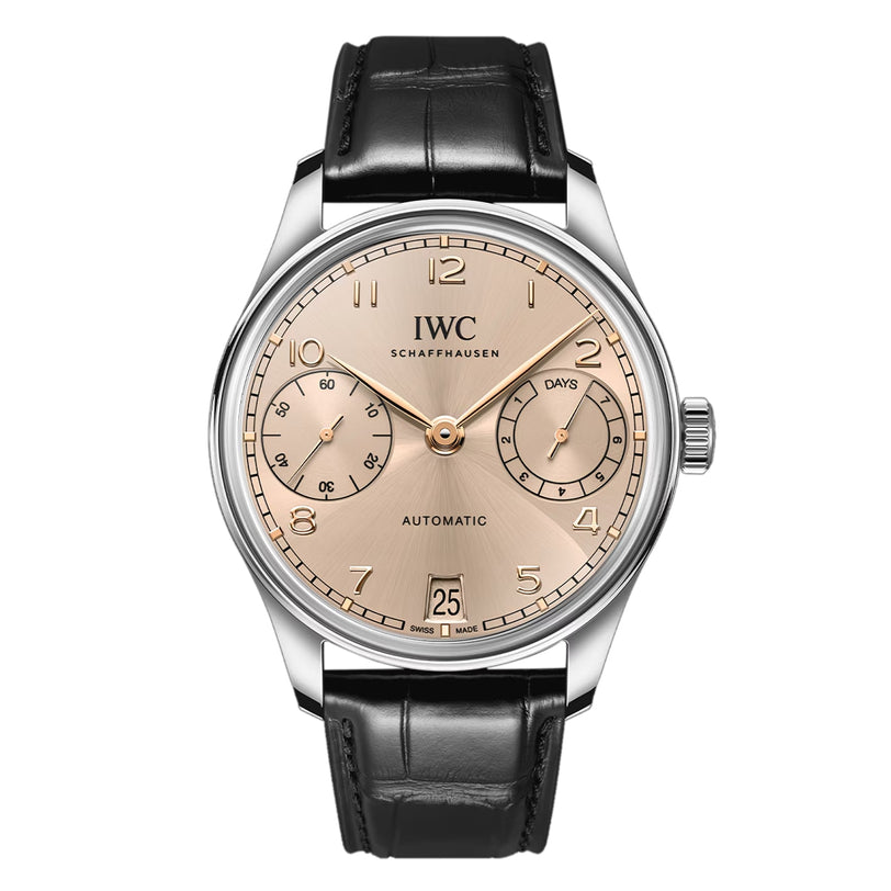 The IWC Schaffhausen Portugieser Automatic 42 features a silver stainless steel case, beige dial, two subdials, date display at 6 o’clock, and a black leather strap.