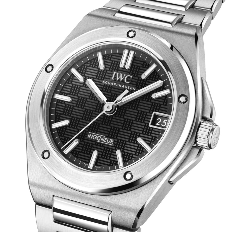 Close-up of the IWC Schaffhausen Ingenieur Automatic 35 wristwatch, featuring a stainless steel case, black textured dial, date display at 3 o’clock, and metal bracelet for enduring sophistication.