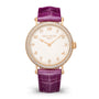 A Patek Philippe Calatrava 7200/200R-001 gold watch with a diamond bezel and purple leather strap on a white background.