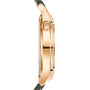 Side view of the Patek Philippe Complication 7130R-014, showcasing its gold case, green strap, and a button on the right side.