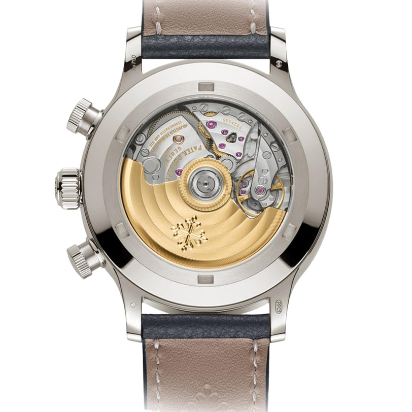 Close-up view of the Patek Philippe Complications 5924G-001’s transparent case back, revealing the intricate mechanical movement inside.