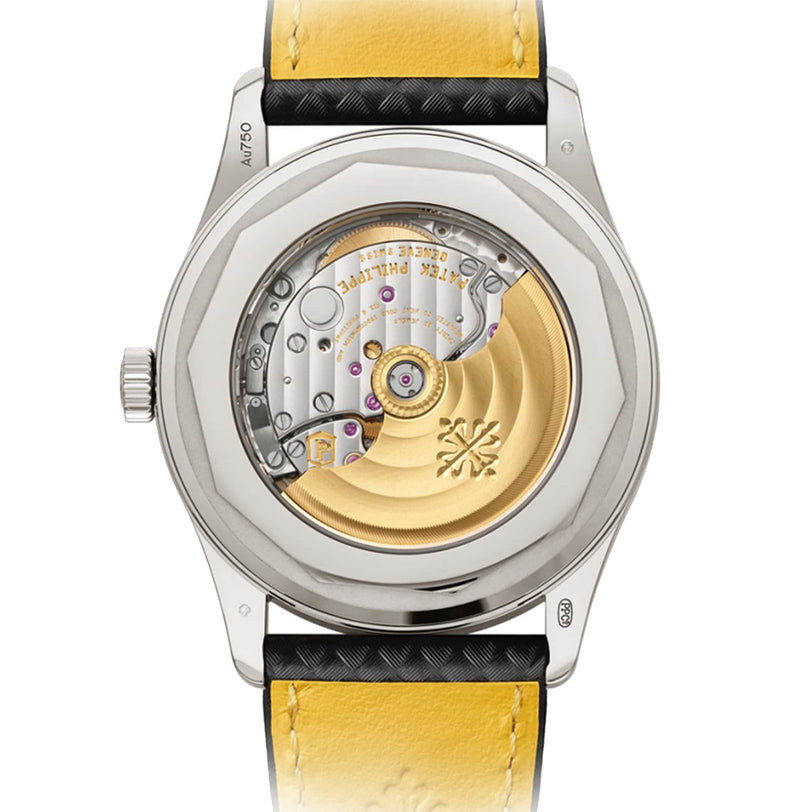 Back view of the Patek Philippe Calatrava 6007G-001, featuring a see-through case that reveals its detailed gold and silver inner mechanics.
