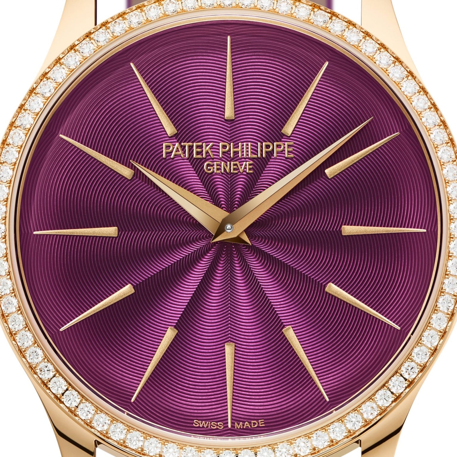 Close-up of the Patek Philippe Calatrava 4997/200R-001 watch featuring a purple dial, gold markers, and a diamond-set bezel.