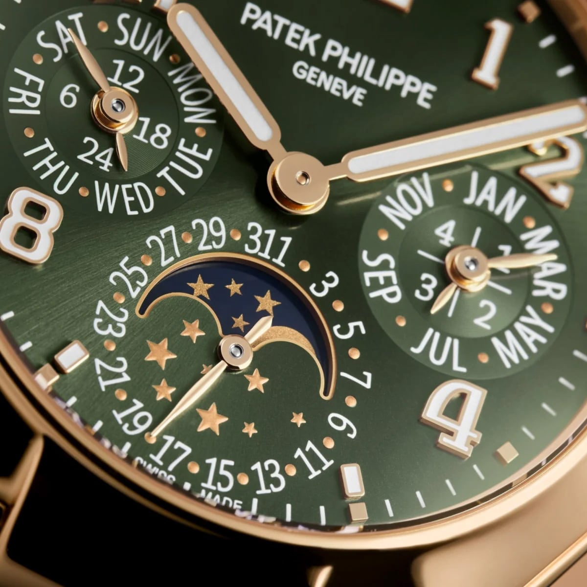 Close-up of the Patek Philippe Twenty~4 7340/1R-010 watch face featuring calendar and moon phase displays.