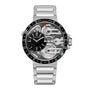 The Armin Strom Orbit Manufacture Edition is a silver wristwatch with a transparent face displaying internal gears, a ceramic bezel, sub-dial, and a red DATE indicator at the top.