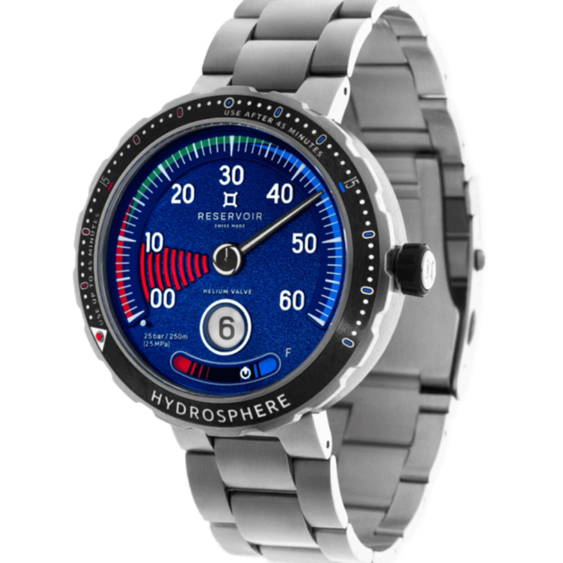 The Reservoir Hydrosphere Blue Hole is a stainless steel wristwatch with a blue dial, gauge-inspired markings, and Hydrosphere displayed on its bezel.