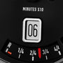 Close-up of the Reservoir GT Tour watch face displaying “06” in a window and a red indicator pointing to 3/4 on the numbered scale.