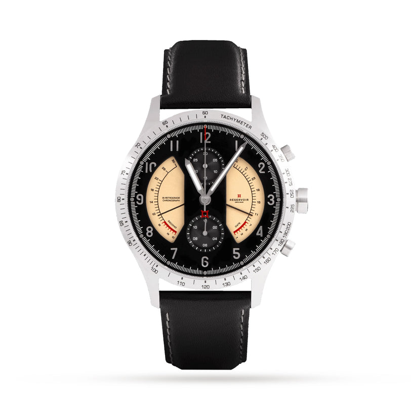 The Reservoir Sonomaster Chronograph Vintage features a black and silver dial, beige accents, and a black leather strap.