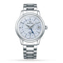 The Grand Seiko Hi-Beat GMT Elegance is a silver wristwatch with a high-beat movement, textured light blue wave-pattern dial, date window at 3 o’clock, and stainless steel bracelet.