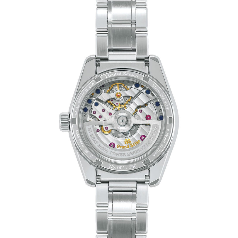 Back view of the Grand Seiko Hi-Beat Heritage stainless steel watch, featuring its precise automatic movement, exposed gears, and a numbered engraving signifying it as a limited edition.