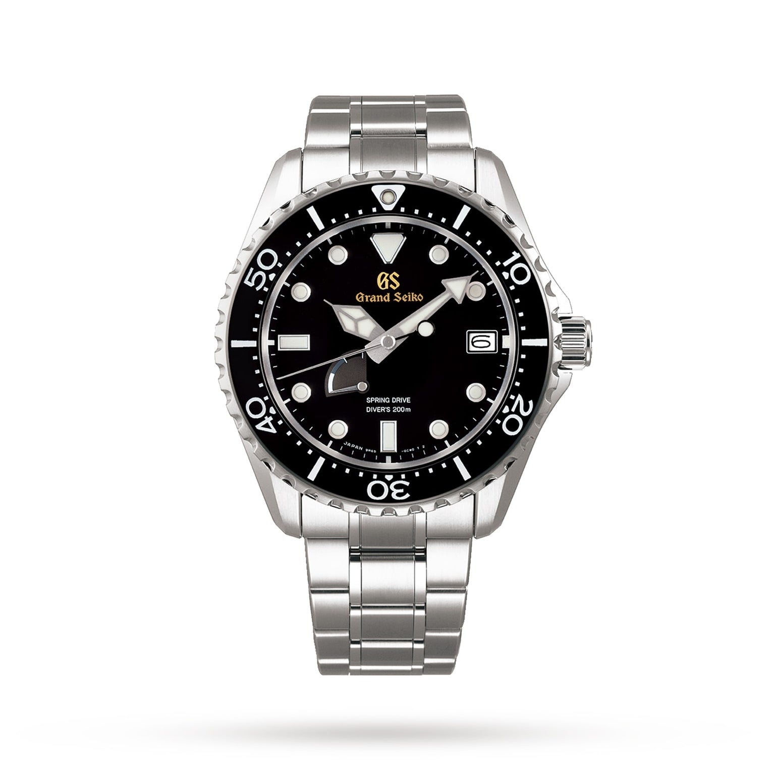 The Grand Seiko Spring Drive Sport is a stainless steel dive watch with black bezel and dial, superb legibility, date window at 3 o’clock, and silver bracelet, shown on a plain white background.