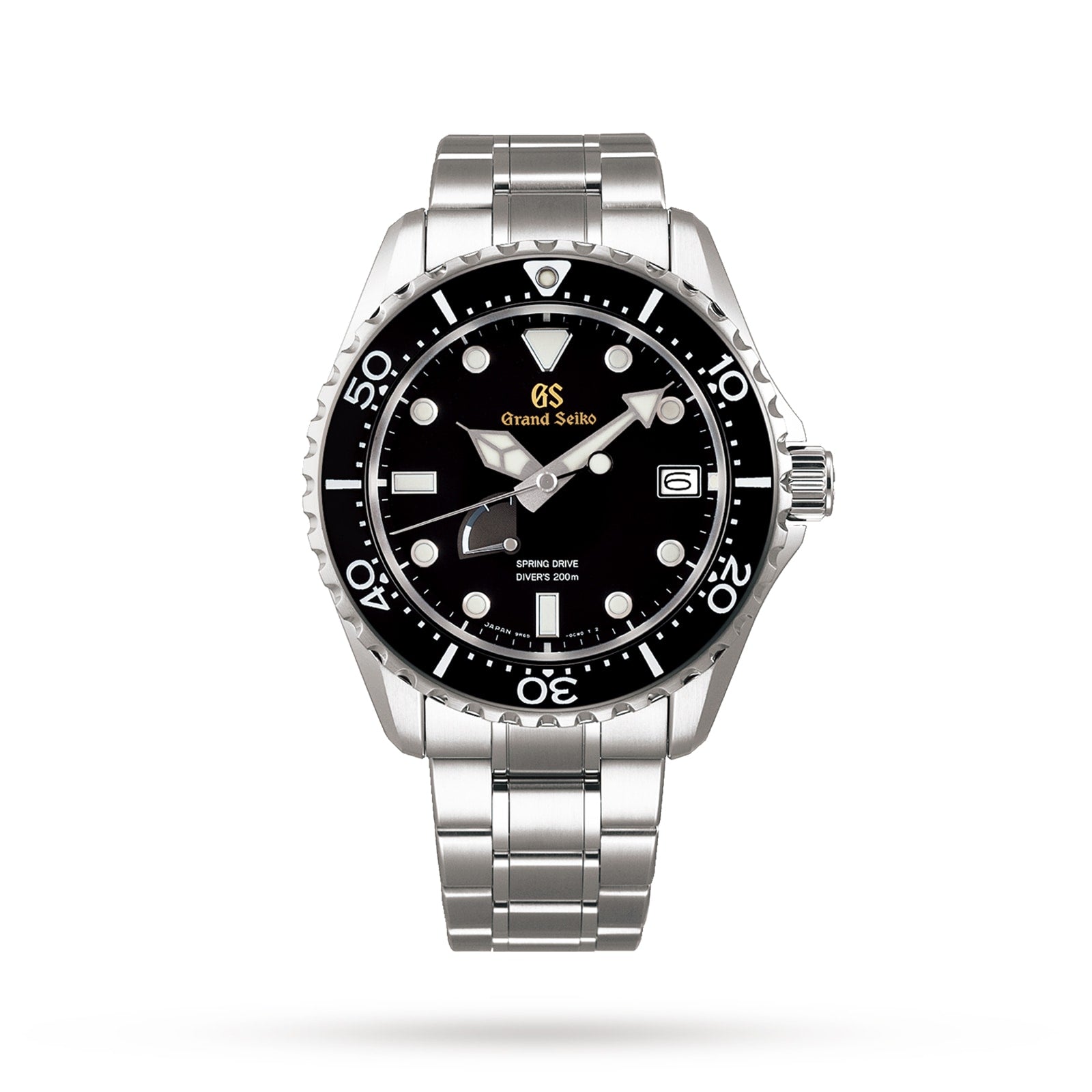 The Grand Seiko Spring Drive Sport is a stainless steel dive watch with black bezel and dial, superb legibility, date window at 3 o’clock, and silver bracelet, shown on a plain white background.
