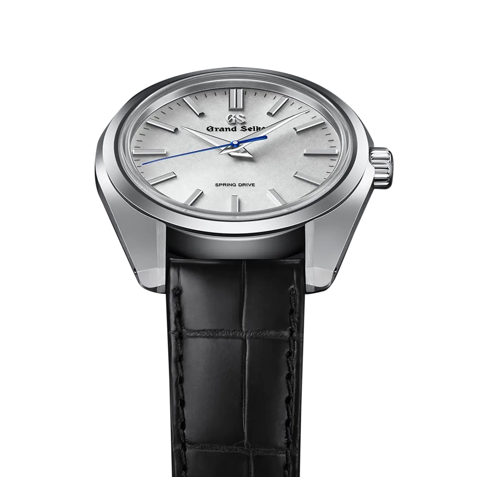 The Grand Seiko Spring Drive Heritage is a 44GS wristwatch with a silver dial, silver markers and hands, a blue second hand powered by Spring Drive, and comes on a black leather strap.