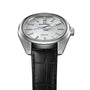 The Grand Seiko Spring Drive Heritage is a 44GS wristwatch with a silver dial, silver markers and hands, a blue second hand powered by Spring Drive, and comes on a black leather strap.