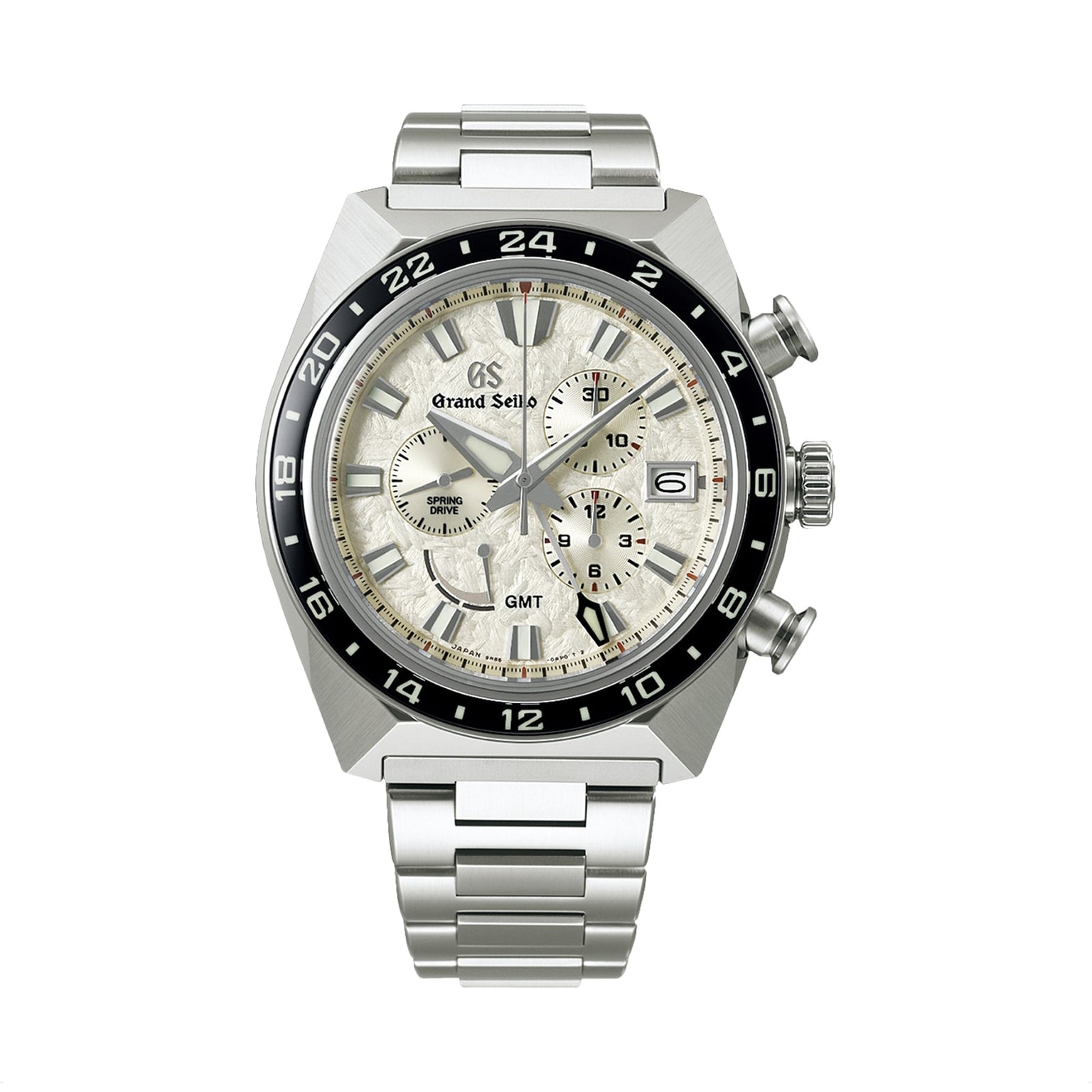 The Grand Seiko Spring Drive Chronograph Sport features a stainless steel case, silver dial, black bezel, Caliber 9R86 movement, chronograph subdials, date window at 3 o’clock, and a metal bracelet.